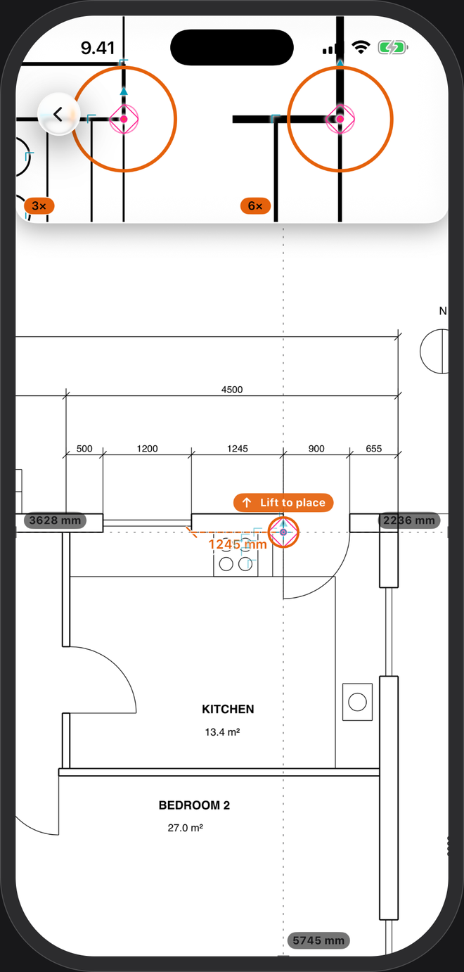 A kitchen wall in PlanTape: a tape dragged to the door frame with the magnifier open, reading 1245 mm